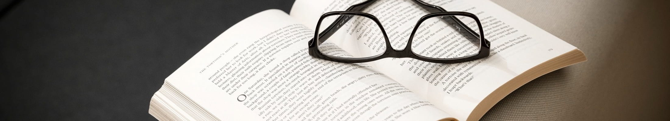 Glasses on book