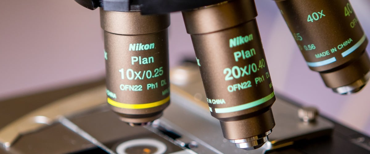 Microscope in a laboratory - Research and development is a key part of high-performance, renewable packaging