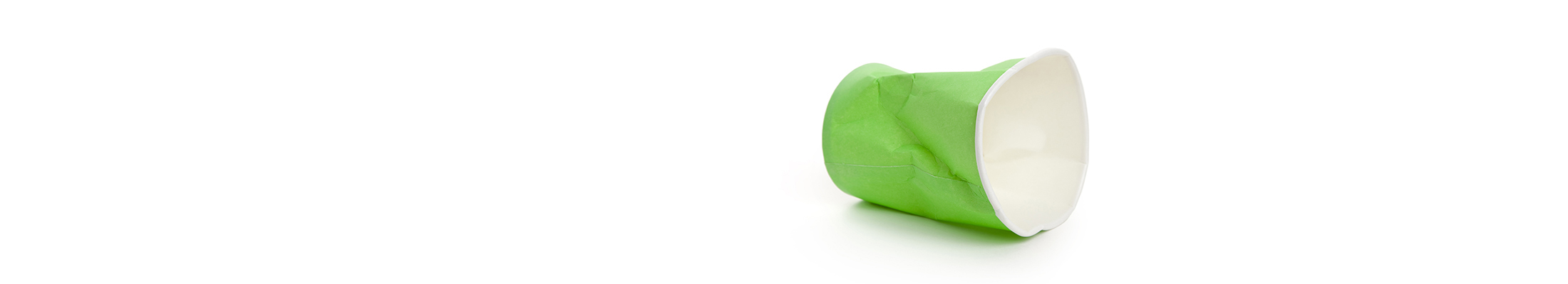 Green used paper coffee cup